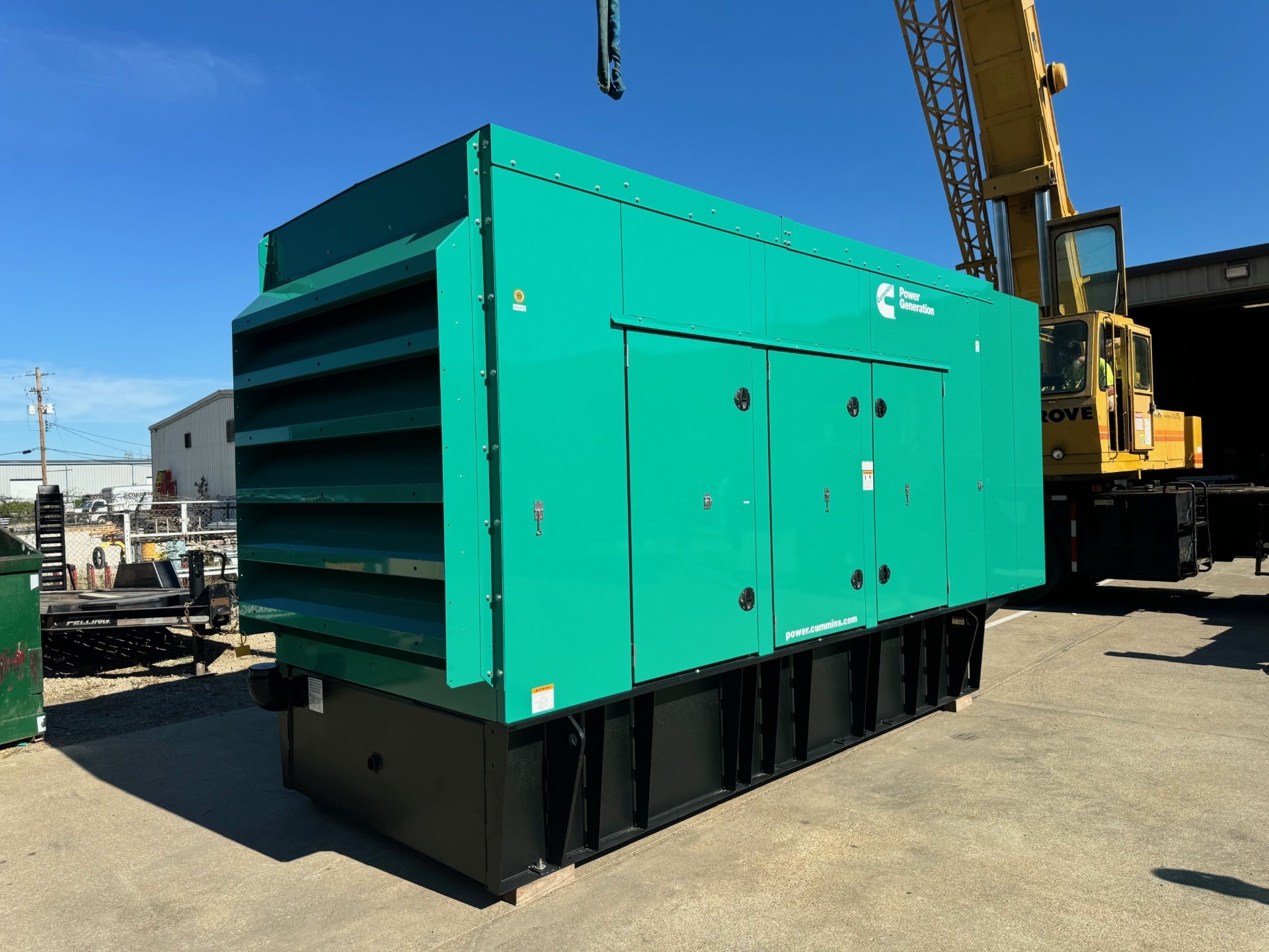 Commercial & Industrial Standby Power from a Cummins 500DFEK 500kW generator with green housing and 24-hour subbase fuel tank