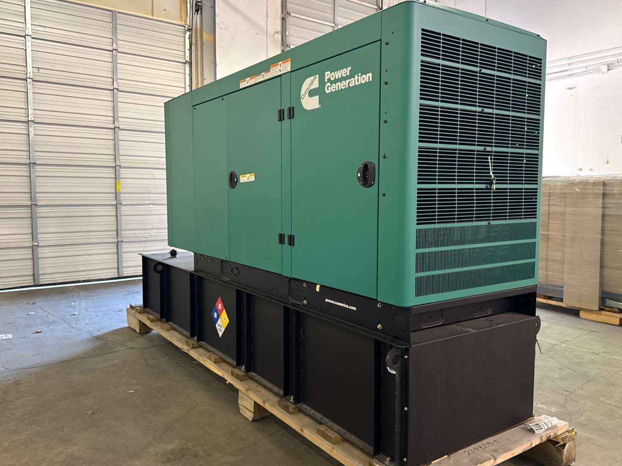 Cummins C80D6C Industrial Generator with green housing and subbase fuel tank